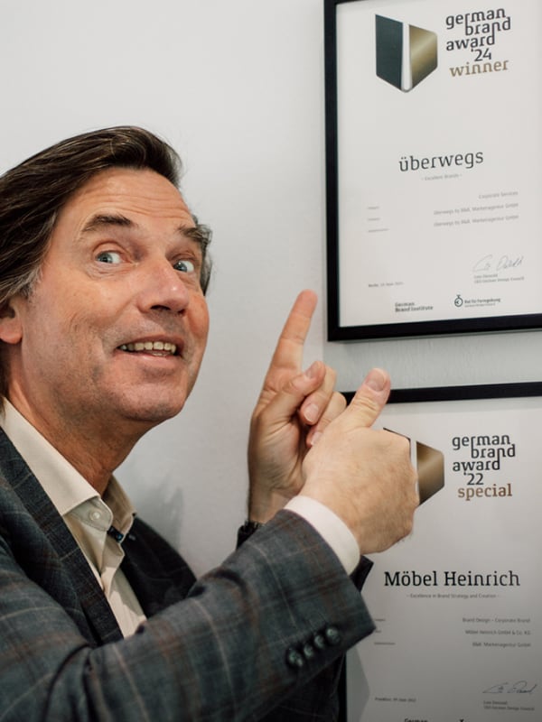 Uwe Berger mit Germand Brand Award 2024 Urkunde